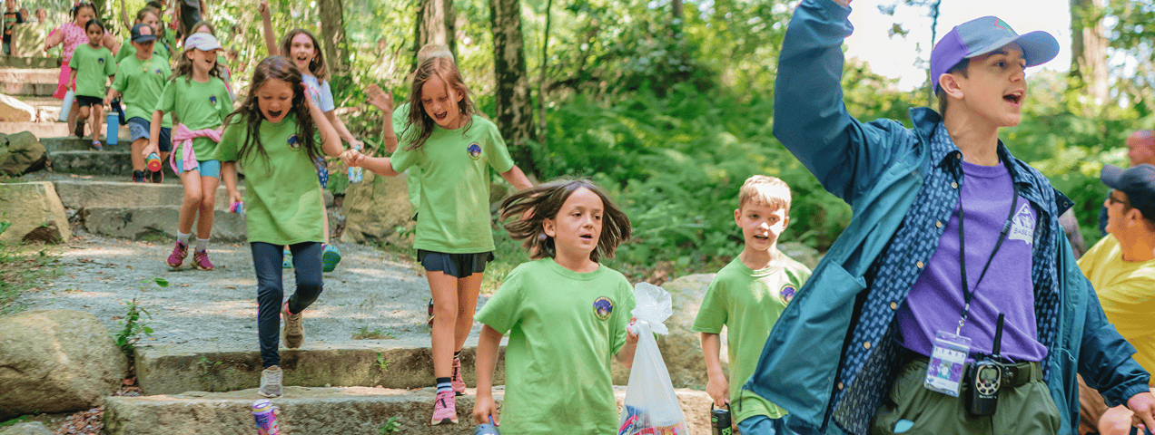 Outdoor Scouts hiking in forest for leadership and adventure.