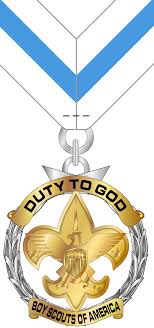 Boy Scouts medal with "Duty to God" inscription and Scout emblem.