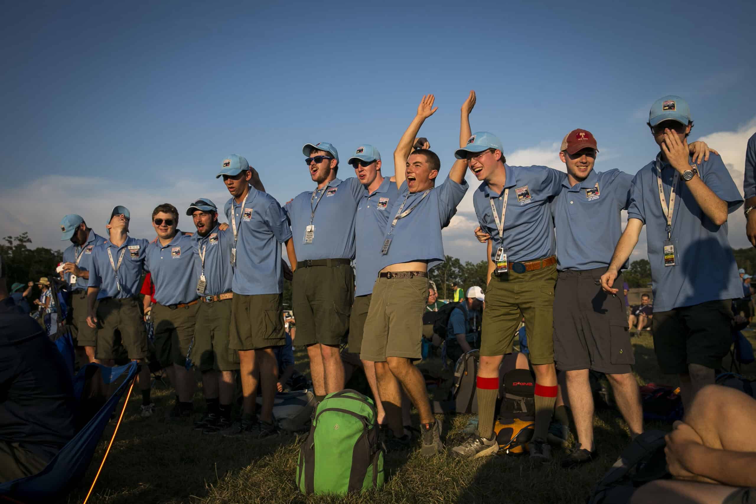 Group of Scouts celebrating at 2026 National Jamboree, Narragansett Council, outdoor event, youth le.