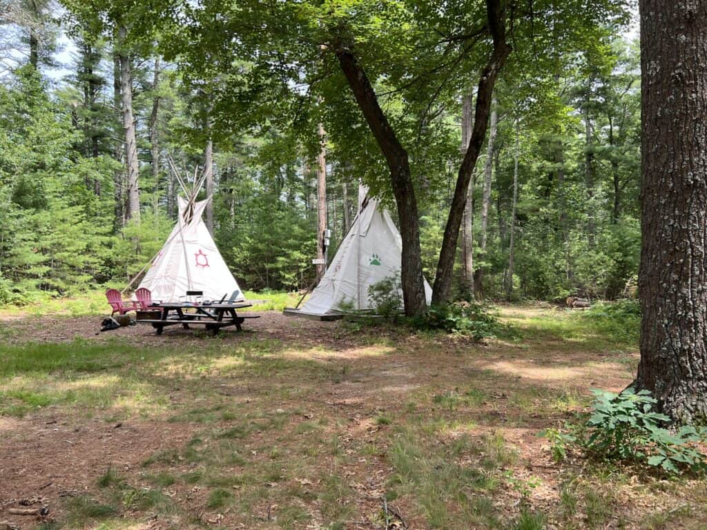 Tents and teepees at a Cub Scout camping event during Cub Together Weekends.